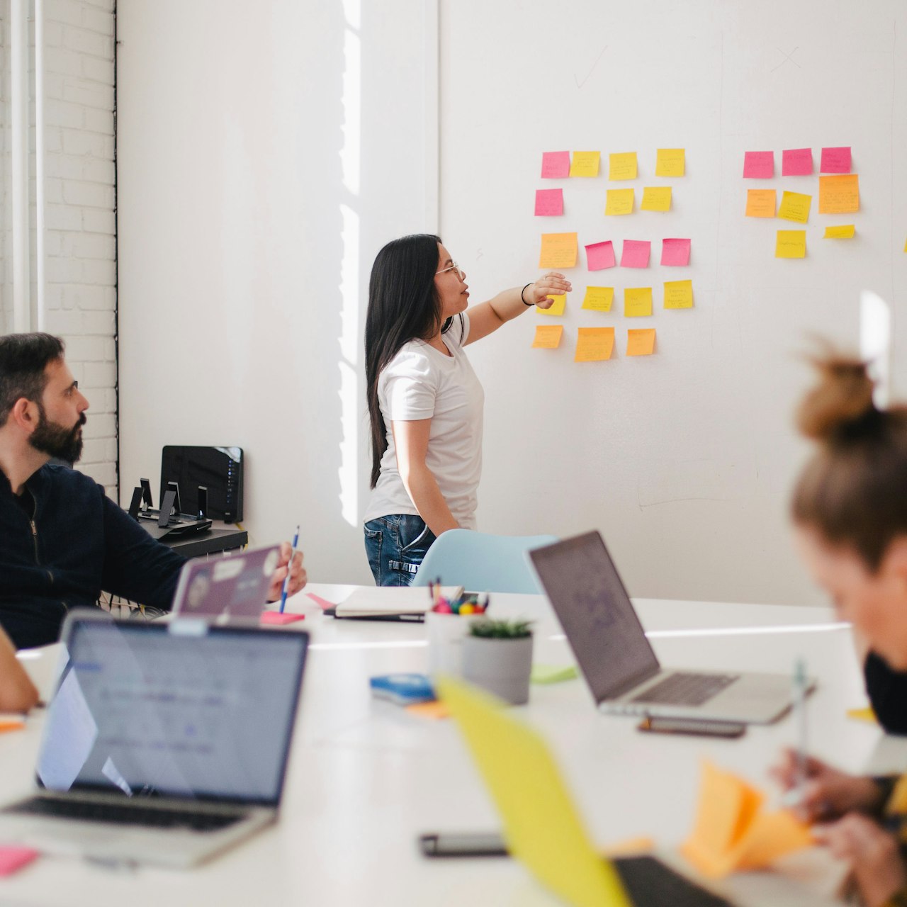Marketing team reviewing analytics and growth dashboards